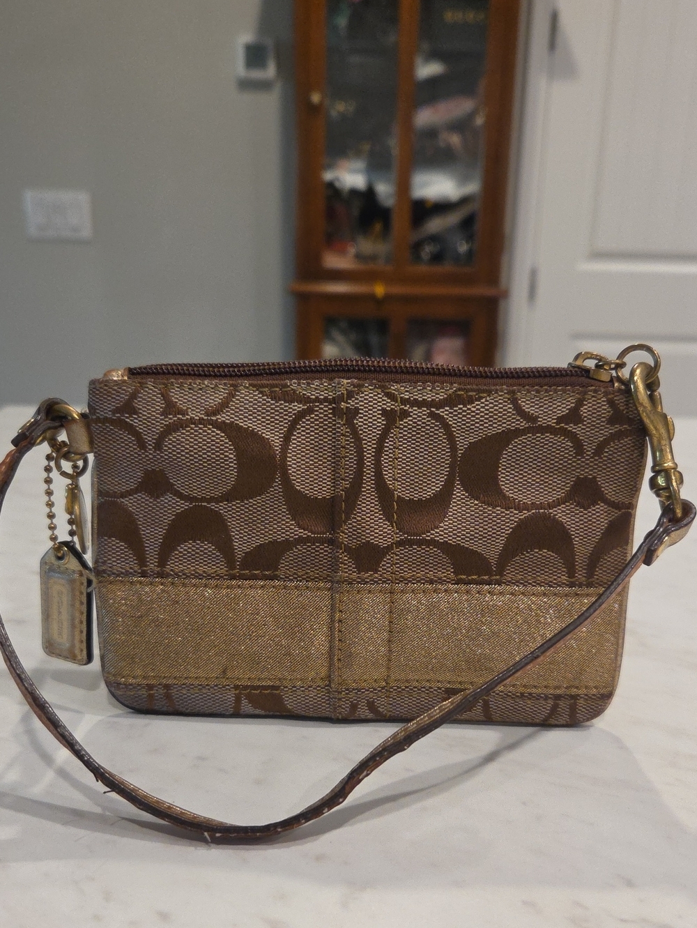 Coach Signature Canvas Wristlet in Brown with Gold Accent